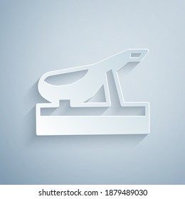 Paper cut Spanish jamon on the wooden jamonera icon isolated on grey background. Paper art style. Vector.