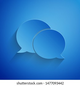 Paper cut Speech bubble chat icon isolated on blue background. Message icon. Communication or comment chat symbol. Paper art style. Vector Illustration