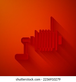 Paper cut Spinning reel for fishing icon isolated on red background. Fishing coil. Fishing tackle. Paper art style. Vector