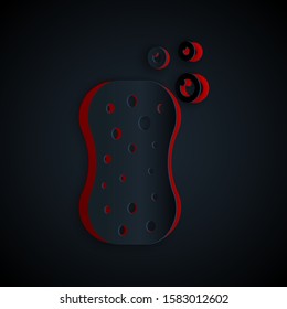 Paper cut Sponge with bubbles icon isolated on black background. Wisp of bast for washing dishes. Cleaning service logo. Paper art style. Vector Illustration