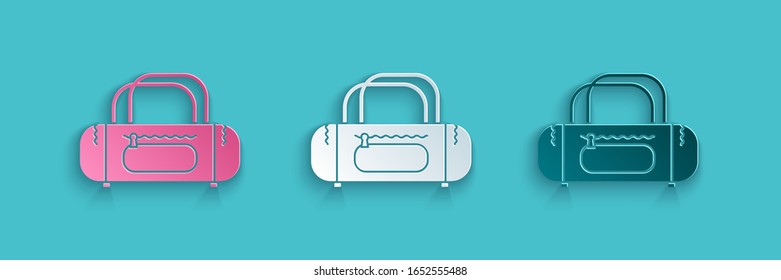 Paper cut Sport bag icon isolated on blue background. Paper art style. Vector Illustration