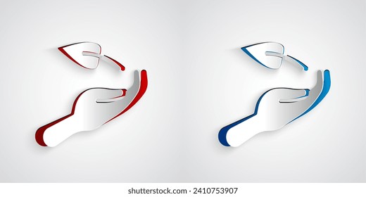 Paper cut Sprout in hand of environmental protection icon isolated on grey background. Seed and seedling. Planting sapling. Ecology concept. Paper art style. Vector