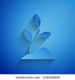 Paper cut Sprout icon isolated on blue background. Seed and seedling. Leaves sign. Leaf nature. Paper art style. Vector Illustration