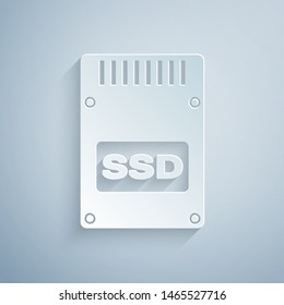 Paper cut SSD card icon isolated on grey background. Solid state drive sign. Storage disk symbol. Paper art style. Vector Illustration