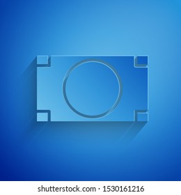 Paper cut Stacks paper money cash icon isolated on blue background. Money banknotes stacks. Bill currency. Paper art style. Vector Illustration