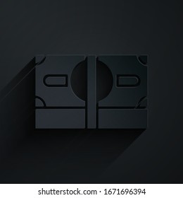 Paper cut Stacks paper money cash icon isolated on black background. Money banknotes stacks. Bill currency. Paper art style. Vector Illustration