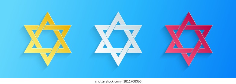 Paper cut Star of David icon isolated on blue background. Jewish religion symbol. Paper art style. Vector.