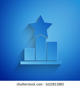 Paper cut Star icon isolated on blue background. Favorite, score, best rating, award symbol. Paper art style. Vector Illustration