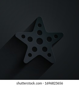 Paper cut Starfish icon isolated on black background. Paper art style. Vector Illustration