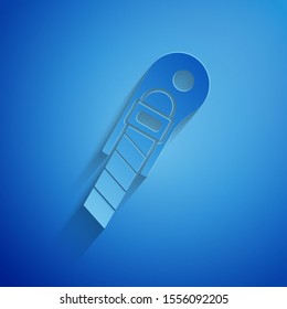 Paper cut Stationery knife icon isolated on blue background. Office paper cutter. Paper art style. Vector Illustration