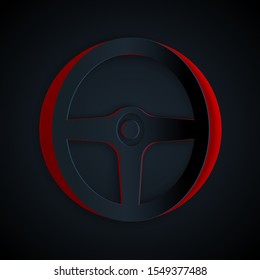 Paper cut Steering wheel icon isolated on black background. Car wheel icon. Paper art style. Vector Illustration