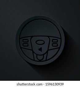 Paper cut Steering wheel icon isolated on black background. Car wheel icon. Paper art style. Vector Illustration