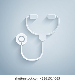 Paper cut Stethoscope medical instrument icon isolated on grey background. Paper art style. Vector Illustration