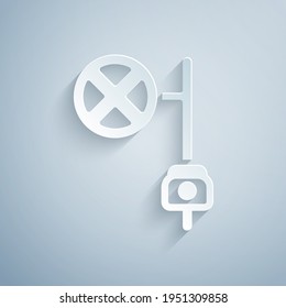Paper cut Stop sign with camera icon isolated on grey background. Traffic regulatory warning stop symbol. Paper art style. Vector