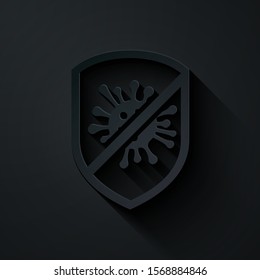 Paper cut Stop virus, bacteria, germs and microbe icon isolated on black background. Antibacterial and antiviral defence, protection infection. Paper art style. Vector Illustration
