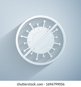Paper cut Stop virus icon isolated on grey background. Corona virus 2019-nCoV. Bacteria and germs, cell cancer, microbe, fungi. Paper art style. Vector Illustration