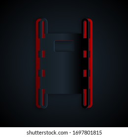 Paper cut Stretcher icon isolated on black background. Patient hospital medical stretcher. Paper art style. Vector Illustration