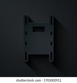 Paper cut Stretcher icon isolated on black background. Patient hospital medical stretcher. Paper art style. Vector Illustration
