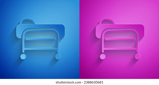 Paper cut Stretcher icon isolated on blue and purple background. Patient hospital medical stretcher. Paper art style. Vector