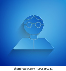 Paper cut Student icon isolated on blue background. Paper art style. Vector Illustration