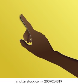 Paper cut style.
A human hand. An illustration stylized as the art of cutting paper. Flat style vector.
A paper hand pointing up against a yellow background.