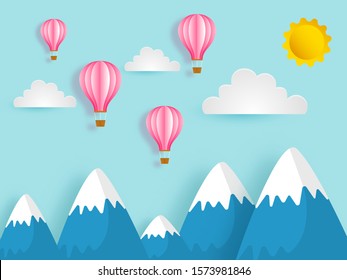 Paper cut style landscape background with hot air balloon, clouds and sun.