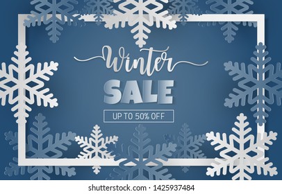 Paper cut style with winter sale banner with blue and white snowflakes on blue background