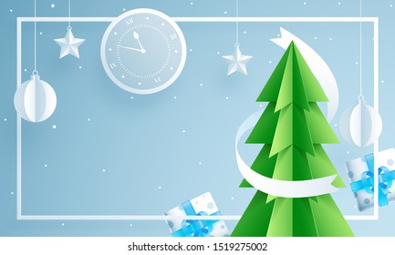 Paper cut style Xmas tree with wall clock, gift boxes, hanging baubles and stars decorated on blue background for Christmas and New Year celebration.