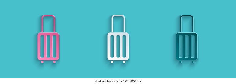 Paper cut Suitcase for travel icon isolated on blue background. Traveling baggage sign. Travel luggage icon. Paper art style. Vector