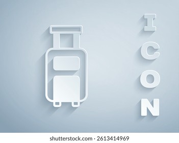 Paper cut Suitcase for travel icon isolated on grey background. Traveling baggage sign. Travel luggage icon. Paper art style. Vector