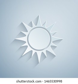 Paper cut Sun icon isolated on grey background. Paper art style. Vector Illustration