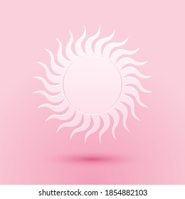 Paper cut Sun icon isolated on pink background. Paper art style. Vector.