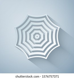 Paper cut Sun protective umbrella fo beach icon isolated on grey background. Large parasol for outdoor space. Beach umbrella. Summer vacation or picnic accessory. Paper art style. Vector Illustration