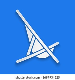 Paper cut Sunbed icon isolated on blue background. Paper art style. Vector Illustration