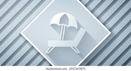 Paper cut Sunbed icon isolated on grey background. Beach umbrella and Sun lounger. Paper art style. Vector