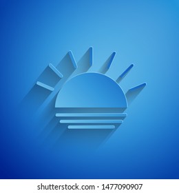 Paper cut Sunset icon isolated on blue background. Paper art style. Vector Illustration