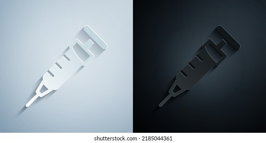 Paper cut Syringe icon isolated on grey and black background. Syringe for vaccine, vaccination, injection, flu shot. Medical equipment. Paper art style. Vector