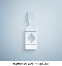 Paper cut Tabasco sauce icon isolated on grey background. Chili cayenne spicy pepper sauce. Paper art style. Vector.