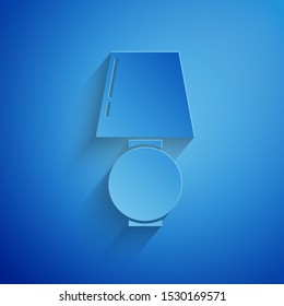 Paper cut Table lamp icon isolated on blue background. Paper art style. Vector Illustration