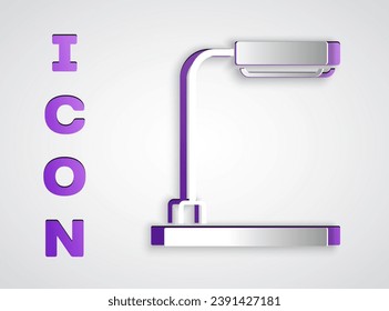 Papierschnitt Tischlampe Symbol einzeln auf grauem Hintergrund. Kunststil aus Papier. Vektorgrafik