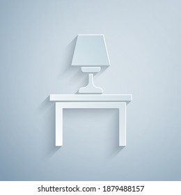 Paper cut Table lamp on table icon isolated on grey background. Paper art style. Vector.