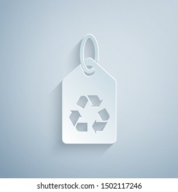 Paper cut Tag with recycle symbol icon isolated on grey background. Banner, label, tag, logo, sticker for eco green. Paper art style. Vector Illustration