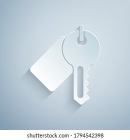 Paper cut tagged key icon isolated on grey background. Paper art style. Vector