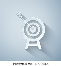 Paper cut Target with arrow icon isolated on grey background. Dart board sign. Archery board icon. Dartboard sign. Business goal concept. Paper art style. Vector Illustration