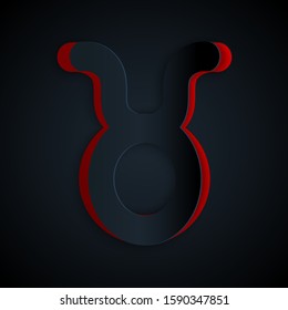 Paper cut Taurus zodiac sign icon isolated on black background. Astrological horoscope collection. Paper art style. Vector Illustration