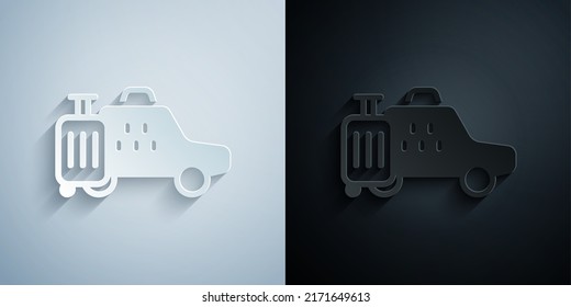 Paper cut Taxi car icon isolated on grey and black background. Paper art style. Vector