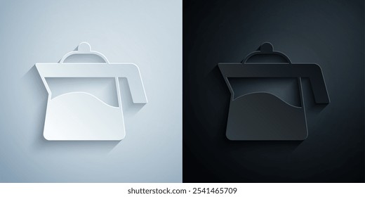 Icono de la tetera del corte de papel aislado en fondo gris y negro. Estilo de arte de papel. Vector