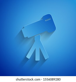 Paper cut Telescope icon isolated on blue background. Scientific tool. Education and astronomy element, spyglass and study stars. Paper art style. Vector Illustration