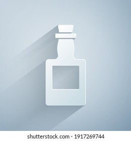 Paper cut Tequila bottle icon isolated on grey background. Mexican alcohol drink. Paper art style. Vector