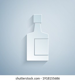 Paper cut Tequila bottle icon isolated on grey background. Mexican alcohol drink. Paper art style. Vector.